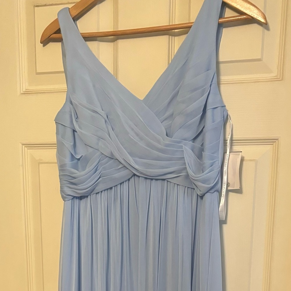 Ice blue gown. Cowl drape in the back.